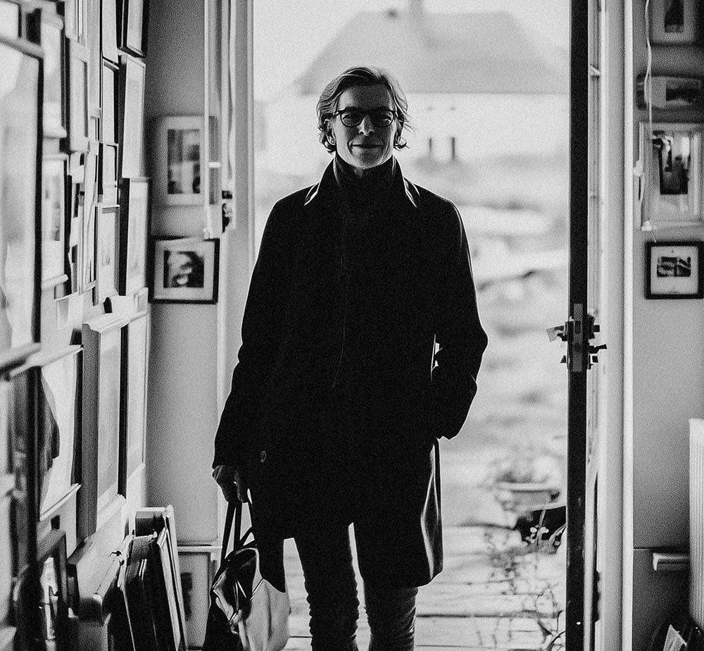 Woman-walking-through-door