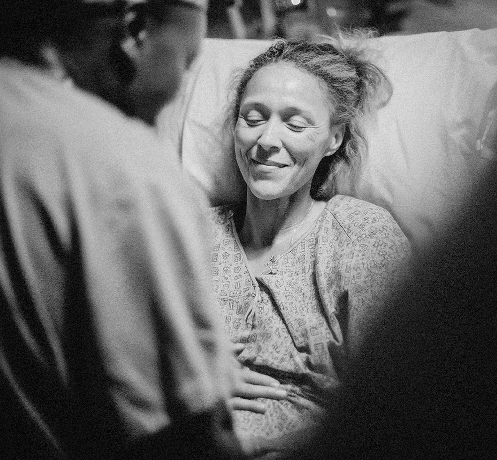 Woman-in-hospital-bed